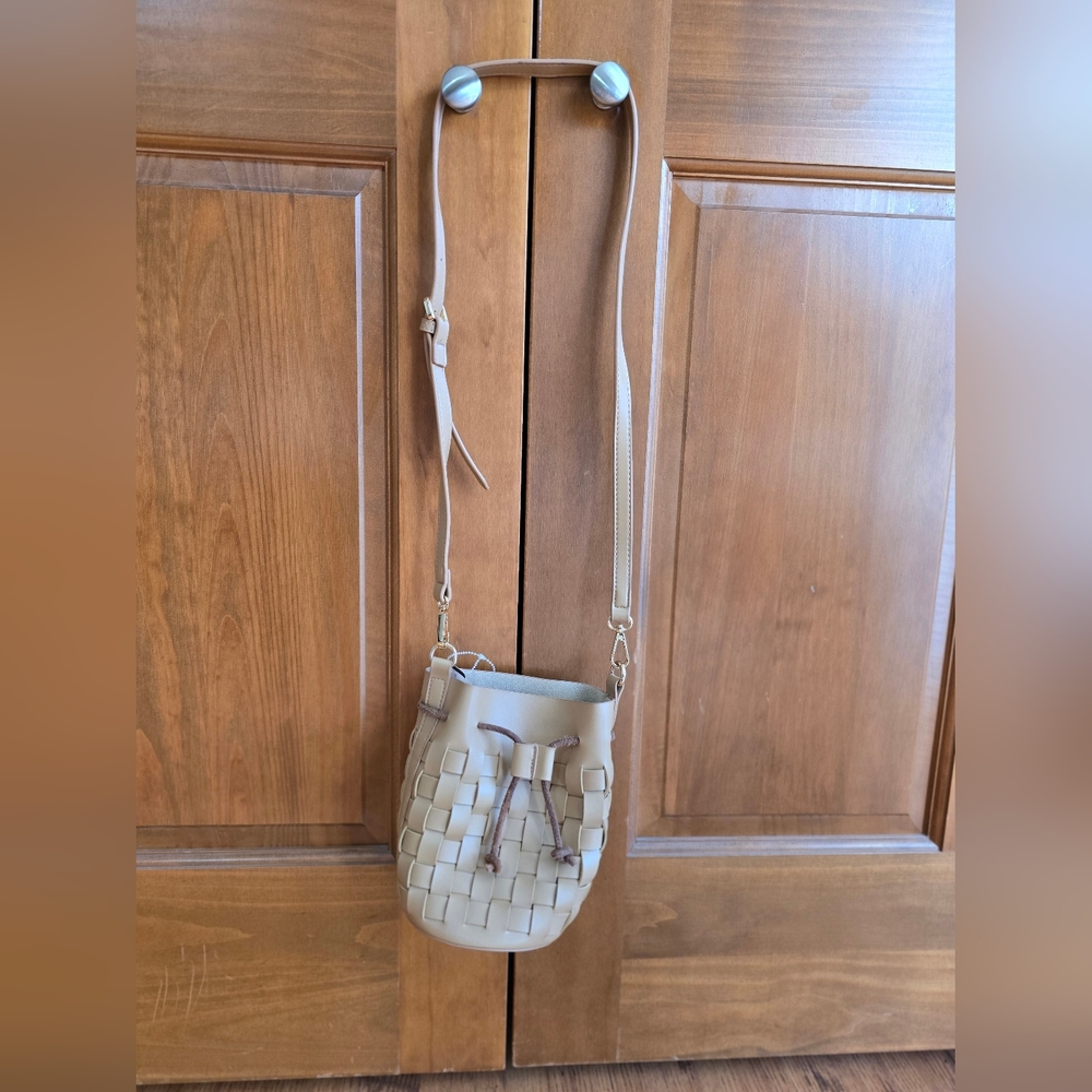 Melie Bianco Woven Bucket Crossbody Bag in Beige